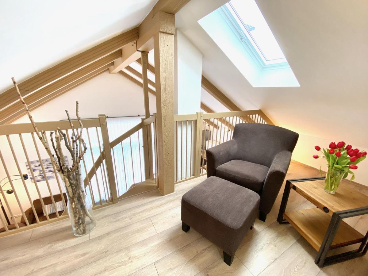 Moenchgut Living & Spa Gager Eksteriør billede A modern oak staircase