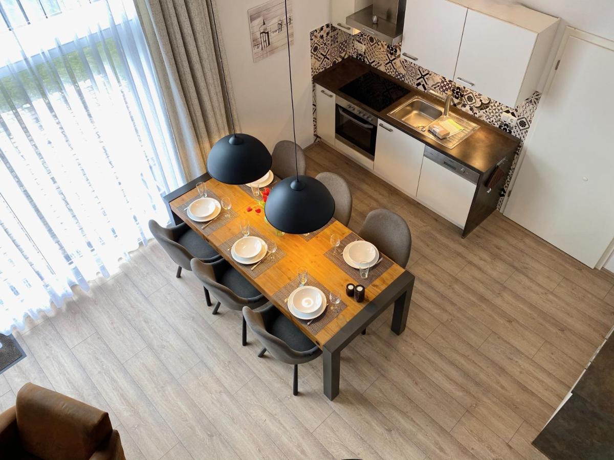 Moenchgut Living & Spa Gager Eksteriør billede A kitchen in a serviced apartment