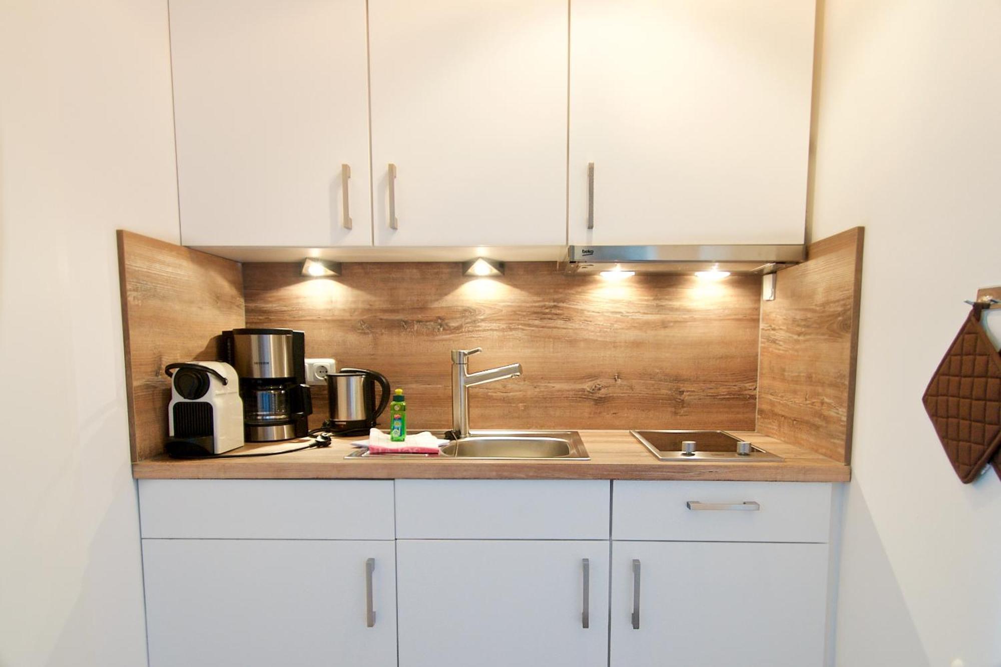 Moenchgut Living & Spa Gager Værelse billede A small kitchenette
