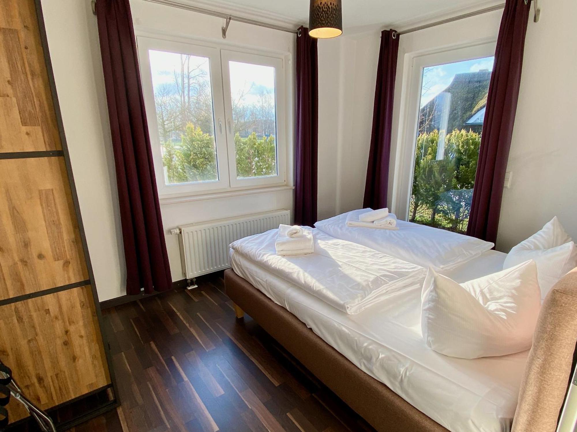 Moenchgut Living & Spa Gager Værelse billede A bedroom in a German hotel
